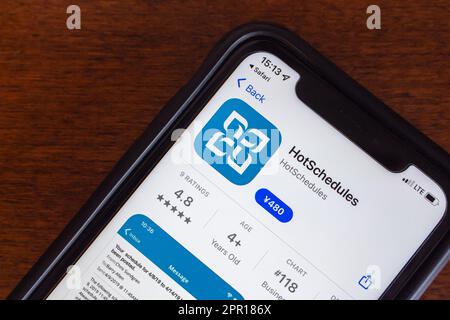 HotSchedules-App im App Store auf einem iPhone. HotSchedules ist eine webbasierte Schichtmanagementanwendung des texanischen Unternehmens hotschedules, inc Stockfoto