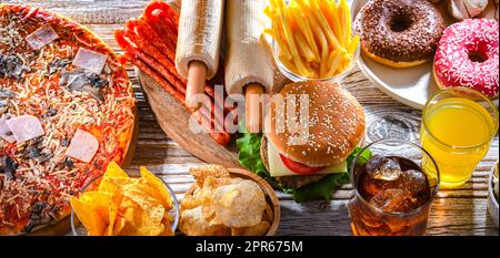 Lebensmittel, die das Krebsrisiko erhöhen. Junk Food Stockfoto