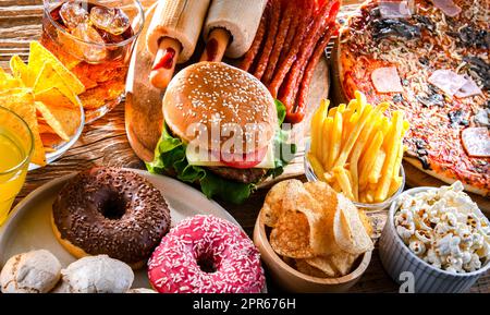 Lebensmittel, die das Krebsrisiko erhöhen. Junk Food Stockfoto