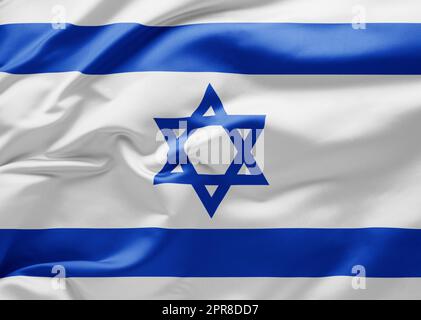 Schwenkende Nationalflagge Israels Stockfoto