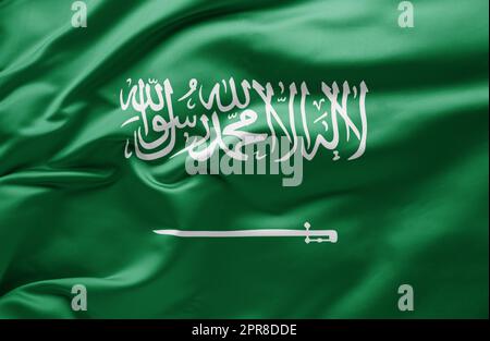Schwenkende Nationalflagge Saudi-Arabiens Stockfoto