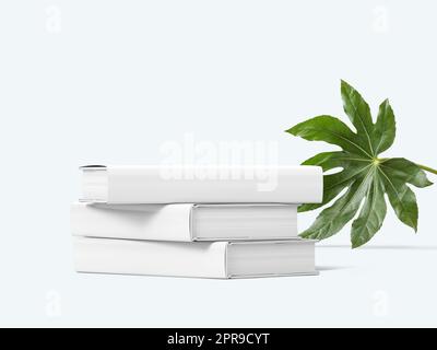 Mockup Buchcover, Stapel von Büchern mit grünen Blättern, 3D Illustration, 3D Rendering Stockfoto