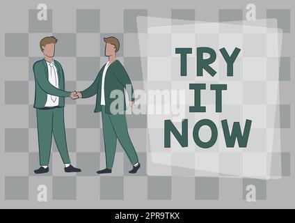 Schreiben Text anzeigen Try IT Now, Business Overview Kostenlose Testversion von etwas Neuem Experimentieren Sie verschiedene Dinge zwei Kollegen, die sich die Hände schütteln gratulieren Stockfoto