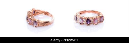 Pinkfarbener und lilafarbener Saphir mit Diamantstein oder Edelsteinen auf weißem Hintergrund mit Reflexion. Sammlung von Accessoires für natürliche Edelsteine. Studioaufnahme Stockfoto