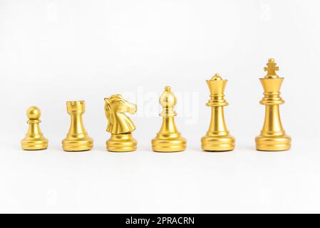 Schachspiel Gold isoliert auf weißem Hintergrund. Stockfoto