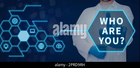 Textbeschriftung, die zeigt, wer Sie sind. Internet-Konzept Vorstellung Identifizieren Sie sich selbst Persönlichkeit mag nicht Doktor mit Handschuhen wichtige Informationen mit einem Finger präsentieren. Stockfoto