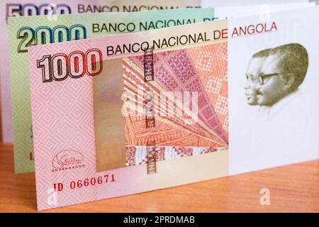 Angolanischen Geld für einen geschäftlichen Hintergrund Stockfoto