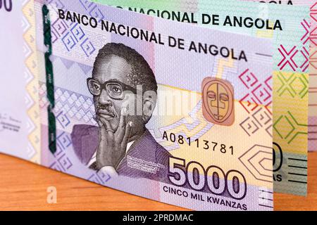 Angolanischen Geld für einen geschäftlichen Hintergrund Stockfoto