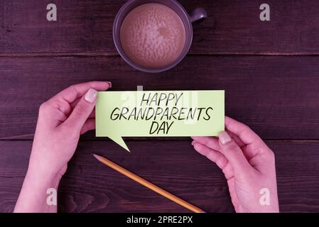 Schild mit Happy Grosselterns Day, Business-Ansatz Ältere Personen oder Senioren Feier Stockfoto