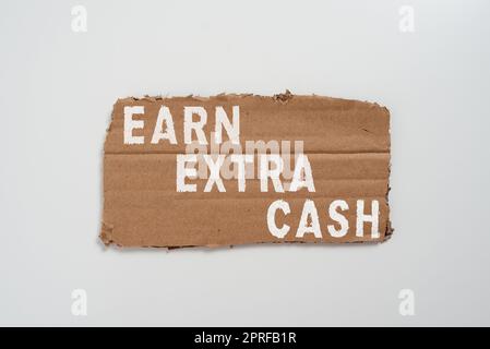 Inspiration mit Schild „Extra Cash verdienen“. Internetkonzept Mehr Geld Mehr Einkommen Bonusgewinne Einnahmen Stockfoto