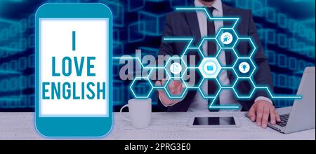 Inspiration mit dem Schild „I Love English“. Business-Showcase, um Zuneigung für internationale Sprache zu zeigen Grammatik stehende Frau trägt VR-Brille und präsentiert wichtige Botschaften. Stockfoto