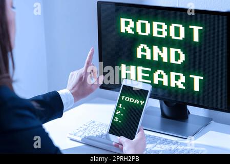 Schreiben mit Text Roboter und Herz. Internetkonzeptsensitivität und Pflege hinter der Maschinentechnologie Stockfoto