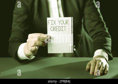 Textschild zeigt Fix your CreditKeep balances low on credit cards and other credit an. Geschäftsidee Halten Sie Guthaben niedrig auf Kreditkarten und anderen Krediten Stockfoto