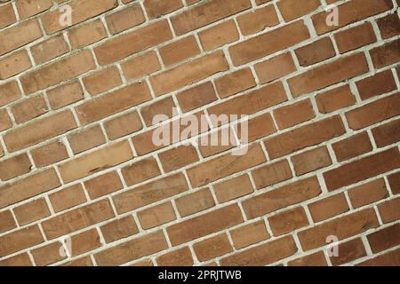 Die Dinge im Gebäude zu halten und die Dinge draußen zu halten. Eine Backsteinmauer. Stockfoto