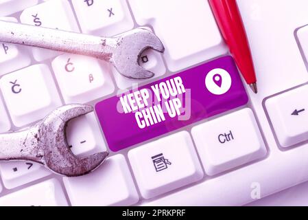 Textunterschrift präsentieren Halten Sie Ihr Chin UpRemain fröhlich unter schwierigen Umständen hoher Geist, Wort für bleiben fröhlich unter schwierigen Umständen H Stockfoto