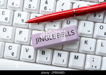 Textschild mit Jingle Bells, Business Approach berühmtestes traditionelles Weihnachtslied auf der ganzen Welt Stockfoto