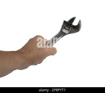 Ein Schraubenschlüssel in der Hand eines Mannes auf transparentem Hintergrund Stockfoto