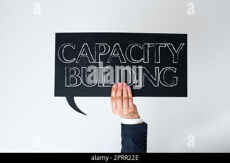 Textüberschrift zur Darstellung von Capacity BuildStrengthen the abilities of Individuals Workforce Planning. Geschäftsidee stärkt die Fähigkeiten des Einzelnen Personalplanung Stockfoto