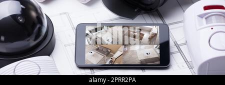 Überwachung Von Smart Home Security-Kameras. Mobiltechnologie Stockfoto