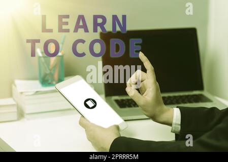Textunterschrift mit der Darstellung „Codieren lernen“. Konzept Bedeutung Lernen Sie, Software zu schreiben sei ein Computer-Programmierer-Coder Stockfoto