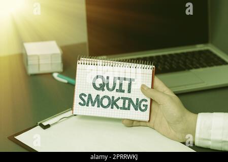 Textschild mit der Aufschrift Rauchen beenden. Geschäftsansatz Einstellung oder Einstellung des Tabakkonsums Stockfoto