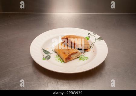 Köstliche authentische mexikanische Chorizo und Käse Tamales Stockfoto