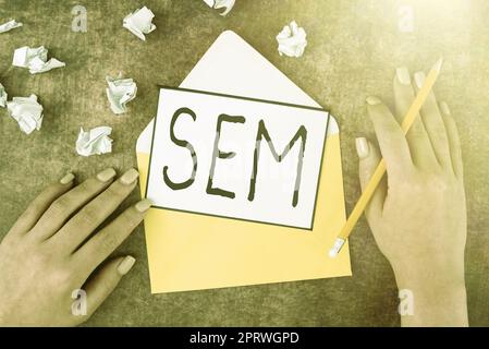 Handschrift Text Sem, Word für Suchmaschinen-Marketing Internet-Marketing beinhaltet die Förderung der Website Stockfoto