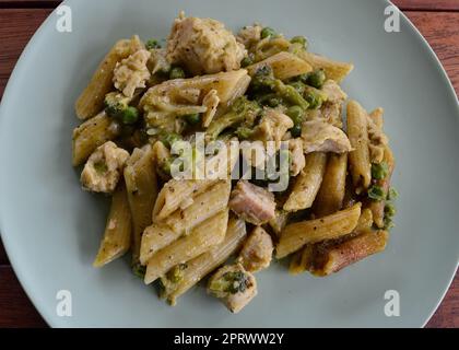 Chicken pesto pasta with vegetables Stock Photo