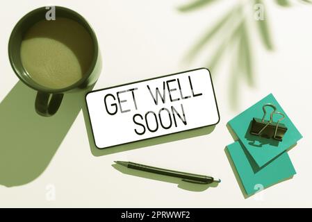 Schild mit der Meldung „Get Well Soon“. Wort geschrieben auf Wunsch haben Sie eine bessere Gesundheit als jetzt Grüße gute Wünsche Stockfoto