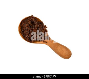 Löffel braunen Muscovado-Rohrzucker auf Weiß Stockfoto