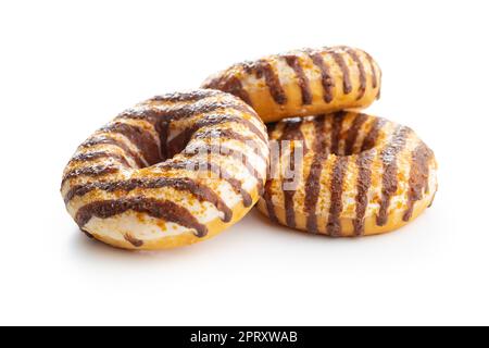 Donuts mit Schokolade und Karamell-Vereisung isoliert auf weißem Hintergrund. Stockfoto