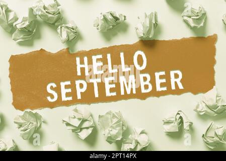 Textunterschrift mit „Hallo September“, Wort zur Begrüßung, die zum Gedenken an den neunten Monat des Jahres verwendet wurde Stockfoto