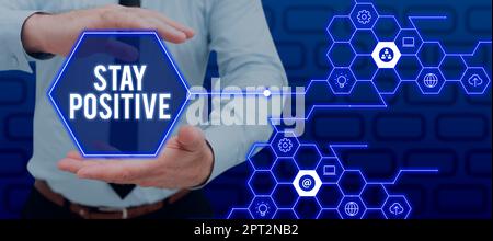 Schreiben mit Text positiv bleiben, Geschäftsansatz sich in aufmunternde Gedanken einlassen optimistisch und real sein Stockfoto