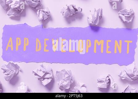 Textunterschrift, die App-Entwicklung, Internet-Konzept, das Computer-Software mit einem speziellen Zweck produziert Stockfoto