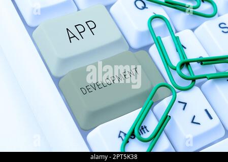 Textunterschrift, die App-Entwicklung, Internet-Konzept, das Computer-Software mit einem speziellen Zweck produziert Stockfoto