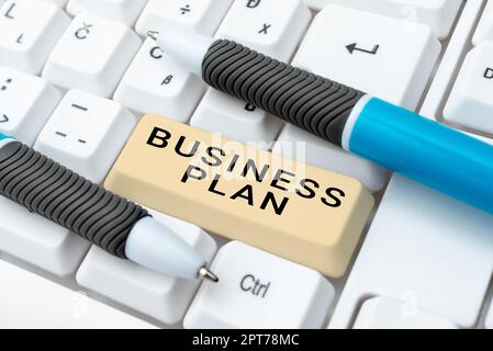 Schreiben mit Text Business Plan, Business Concept Structural Strategy Ziele und Ziele finanzielle Projektionen Stockfoto