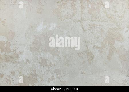 Strukturierte beige Vinyltapete als Hintergrund. Stockfoto