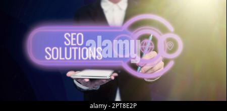 Hand schreiben Zeichen Seo Solutions, Internet-Konzept Suchmaschine Ergebnis Seite erhöhen Besucher durch Rankings Stockfoto