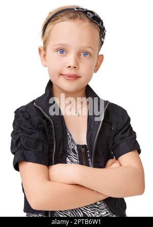 Sie ist ein stilvolles junges Mädchen - Kindermode. Ein junges Mädchen, das im Studio posiert Stockfoto