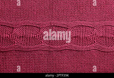 Gestricktes Viva Magenta-Material, Nahaufnahme Stockfoto