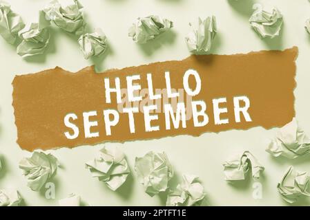 Textunterschrift mit „Hallo September“, Wort zur Begrüßung, die zum Gedenken an den neunten Monat des Jahres verwendet wurde Stockfoto