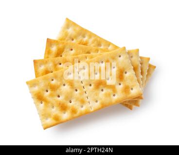 Cracker übereinander auf weißem Hintergrund platziert. Von oben gesehen. Stockfoto