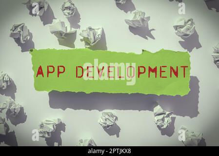 Textunterschrift, die App-Entwicklung, Konzept bedeutet, Computersoftware mit einem speziellen Zweck zu produzieren Stockfoto