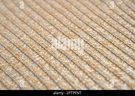 Meliert beige gestrickten Wollpullover. Textur Detail Nahaufnahme. Stockfoto