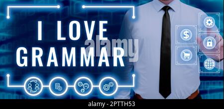Schild mit der Aufschrift „I Love Grammar“, „Business Approach Act of Bewundering System“ und „Structure of Language“ Stockfoto