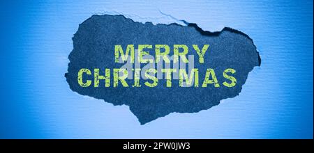 Text Frohe Weihnachten, Wort für die jährliche Tradition, um die Geburt Jesu Christi zu feiern Stockfoto