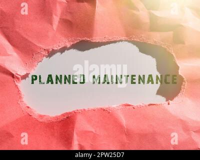 Textzeichen mit planmäßiger Wartung, Word für regelmäßig durchzuführende Kontrollen Stockfoto