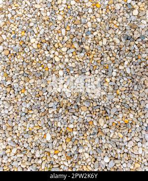 Detailbild eines Bereichs mit kleinen Steinen von einfacher Größe Stockfoto