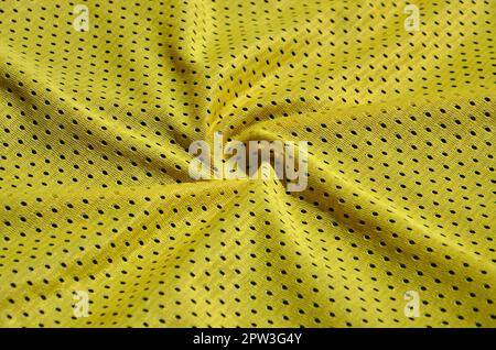 Textur von Sportbekleidung aus Polyester Faser. Oberbekleidung für Sport Training hat ein Gitter Textur von dehnbarem Nylon Stockfoto