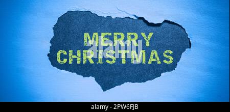 Text Frohe Weihnachten, Wort für die jährliche Tradition, um die Geburt Jesu Christi zu feiern Stockfoto